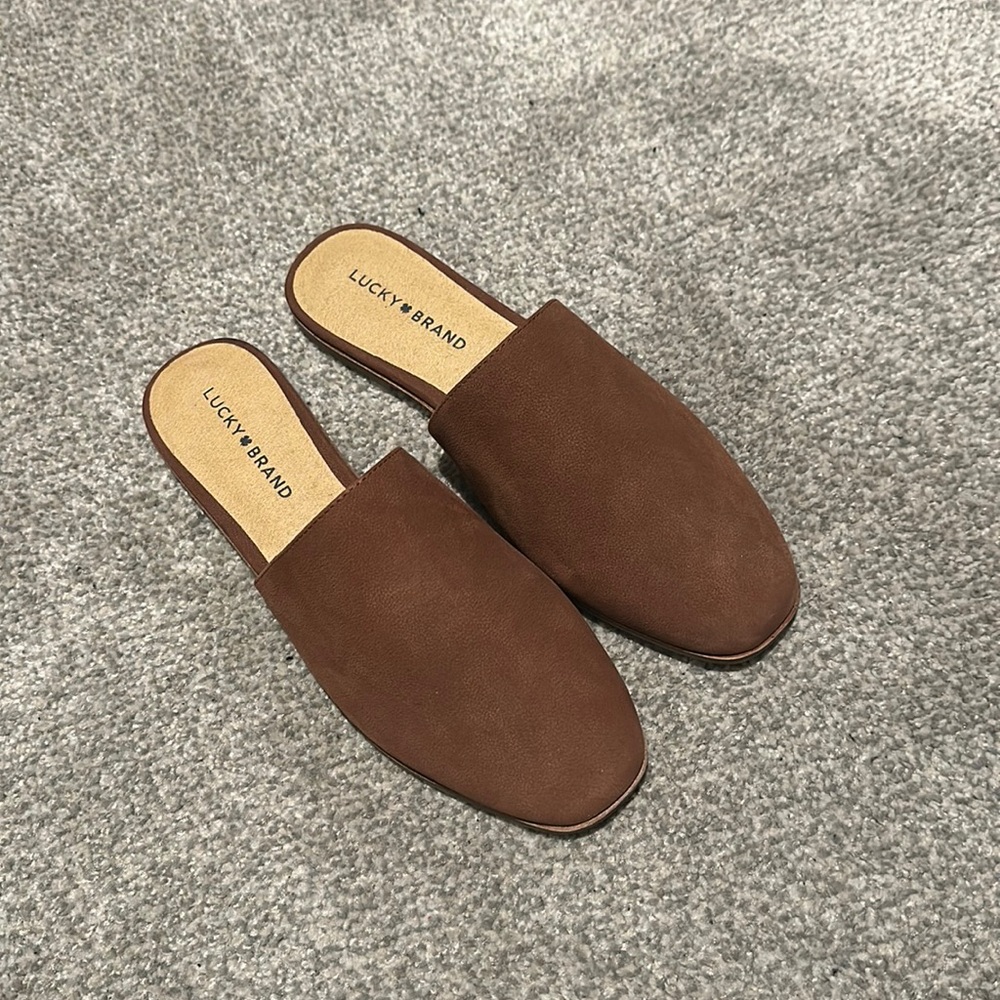 Lucky brand mules/clogs/slip ons. Never been worn.